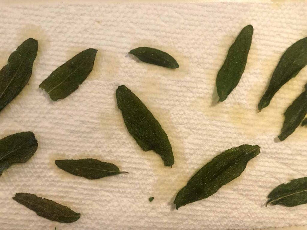 drying fried sage leaves on paper towel