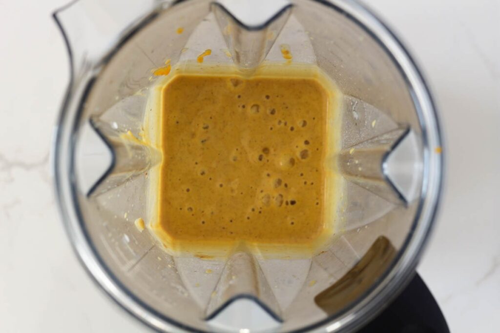 blended pumpkin smoothie ingredients in blender