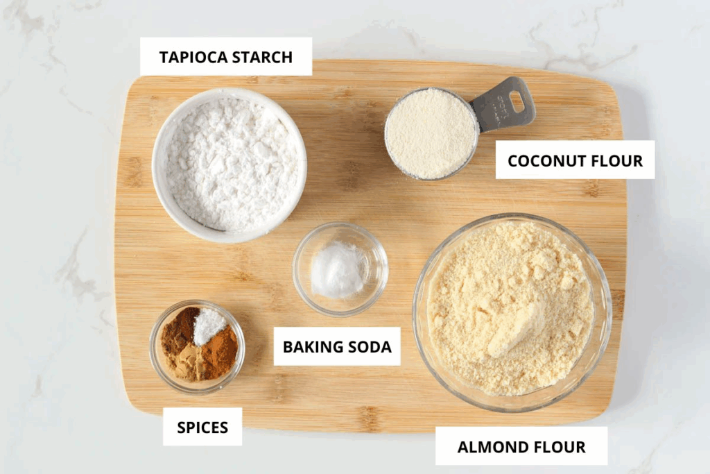 Gluten free pumpkin waffles dry ingredients on wooden board