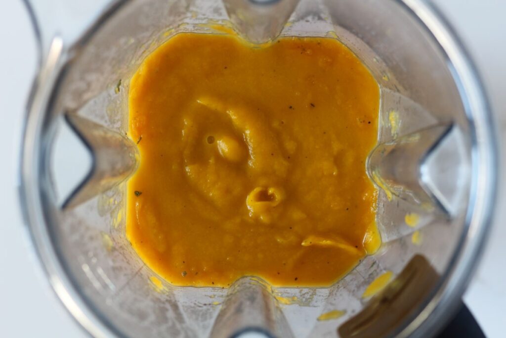 blended butternut squash apple soup in blender